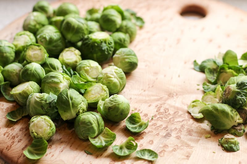 Removing stems from Brussels Sprouts